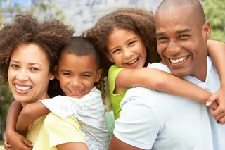Family of satisfied dental patients